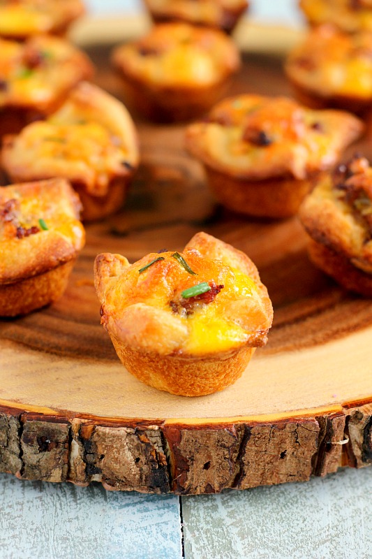 These Mini Sausage Quiches make a delicious, savory dish for your next breakfast or brunch. Filled with zesty sausage, mozzarella cheese and eggs, this recipe is perfect to satisfy your breakfast cravings!