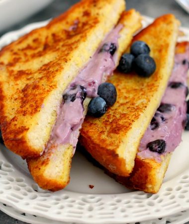 This Blueberry Cheesecake Stuffed French Toast is filled with a sweet cream cheese mixture and then baked until golden. It's simple to prepare and makes an indulgent breakfast that will wow your taste buds!