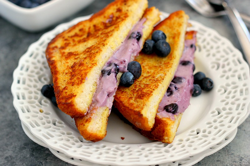 This Blueberry Cheesecake Stuffed French Toast is filled with a sweet cream cheese mixture and then baked until golden. It's simple to prepare and makes an indulgent breakfast that will wow your taste buds!