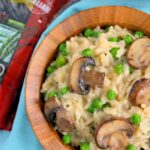 These Creamy Parmesan, Mushroom and Pea Risotto Bowls are filled with nourishing ingredients for an easy and healthier meal. Packed with Parmesan cheese, fresh mushrooms and peas, these bowls provide comfort food at its finest!