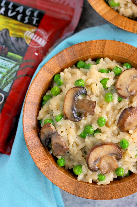 These Creamy Parmesan, Mushroom and Pea Risotto Bowls are filled with nourishing ingredients for an easy and healthier meal. Packed with Parmesan cheese, fresh mushrooms and peas, these bowls provide comfort food at its finest!