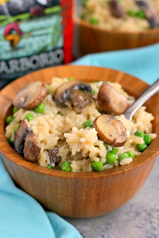 These Creamy Parmesan, Mushroom and Pea Risotto Bowls are filled with nourishing ingredients for an easy and healthier meal. Packed with Parmesan cheese, fresh mushrooms and peas, these bowls provide comfort food at its finest!