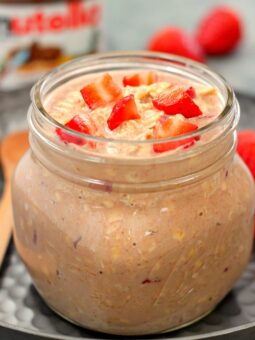 These Strawberry Nutella Overnight Oats are a delicious way to start your morning! Filled with creamy Greek Yogurt, fresh strawberries and a swirl of Nutella, these protein-packed oats are irresistibly sweet and secretly good for you!