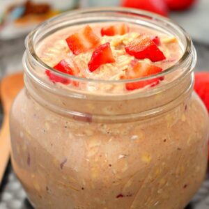 These Strawberry Nutella Overnight Oats are a delicious way to start your morning! Filled with creamy Greek Yogurt, fresh strawberries and a swirl of Nutella, these protein-packed oats are irresistibly sweet and secretly good for you!