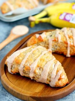 These Banana Bread Scones with Cinnamon Cream Cheese Glaze are crispy on the outside and tender on the inside. The scones are drizzled with a sweet glaze, which makes these treats perfect for breakfast, dessert, or a mid-morning snack!