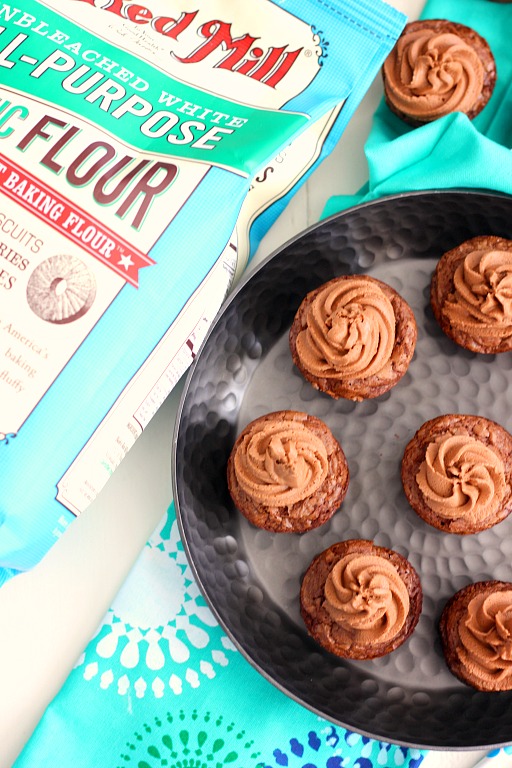 These Brownie Bites with Nutella Frosting are thick, fudgy, and chewy. Topped with a creamy Nutella frosting and made in bite-sized form, these make the ultimate treat!