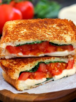 This Caprese Grilled Cheese is filled with fresh basil, creamy mozzarella cheese, and juicy tomatoes. It's a unique twist on a classic sandwich that is packed with flavor and easy to prepare!