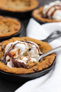 skillet cookie with ice cream and a spoon