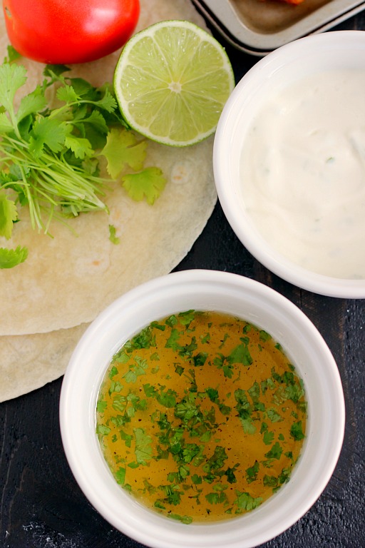 These Cilantro Lime Popcorn Shrimp Tacos are filled with crispy popcorn shrimp, a zesty cilantro lime sauce, and topped with a cilantro cream drizzle. Easy to make and ready in just 20 minutes, this flavorful dish will be the hit of your dinner table!