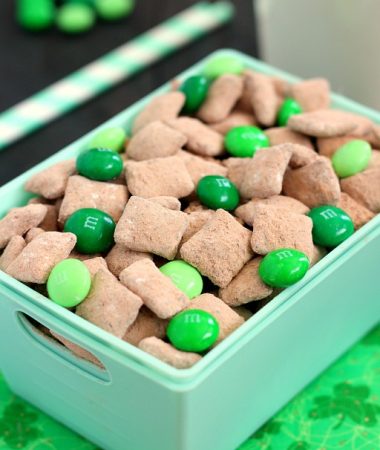 Mint Brownie Muddy Buddies make the most deliciously, decadent snack! Chex cereal is coated in creamy mint chocolate, and then tossed with brownie mix. It creates an irresistible treat that's perfect to serve for St. Patrick's Day, or any other time when you need a chocolate fix!