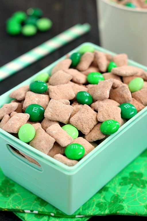 Mint Brownie Muddy Buddies make the most deliciously, decadent snack! Chex cereal is coated in creamy mint chocolate, and then tossed with brownie mix. It creates an irresistible treat that's perfect to serve for St. Patrick's Day, or any other time when you need a chocolate fix!