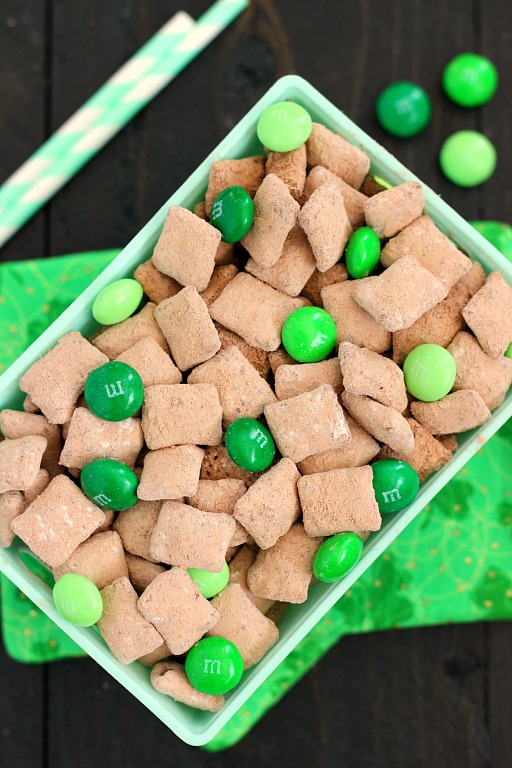 Mint Brownie Muddy Buddies make the most deliciously, decadent snack! Chex cereal is coated in creamy mint chocolate, and then tossed with brownie mix. It creates an irresistible treat that's perfect to serve for St. Patrick's Day, or any other time when you need a chocolate fix!