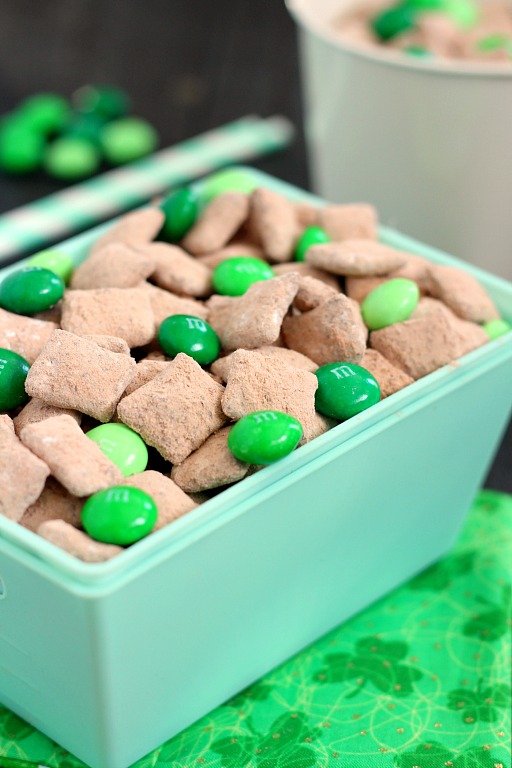 Mint Brownie Muddy Buddies make the most deliciously, decadent snack! Chex cereal is coated in creamy mint chocolate, and then tossed with brownie mix. It creates an irresistible treat that's perfect to serve for St. Patrick's Day, or any other time when you need a chocolate fix!
