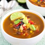 This Slow Cooker Chicken Tortilla Soup is filled with tender chicken, diced tomatoes, corn, black beans, and a combination of spices. With hardly any prep work involved, this flavorful meal will quickly become a household favorite!