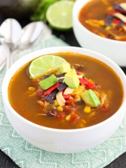 This Slow Cooker Chicken Tortilla Soup is filled with tender chicken, diced tomatoes, corn, black beans, and a combination of spices. With hardly any prep work involved, this flavorful meal will quickly become a household favorite!