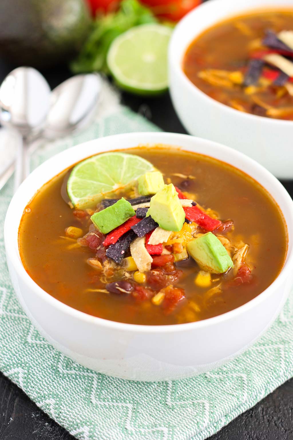 This Slow Cooker Chicken Tortilla Soup is filled with tender chicken, diced tomatoes, corn, black beans, and a combination of spices. With hardly any prep work involved, this flavorful meal will quickly become a household favorite!