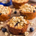 These Blueberry Granola Oatmeal Muffins are packed with hearty oats, fresh blueberries, and topped with sweet granola. Crunchy on the outside and soft on the inside, this simple breakfast can be prepped the night before and made in the morning. These muffins make the most deliciously easy on-the-go breakfast or snack!