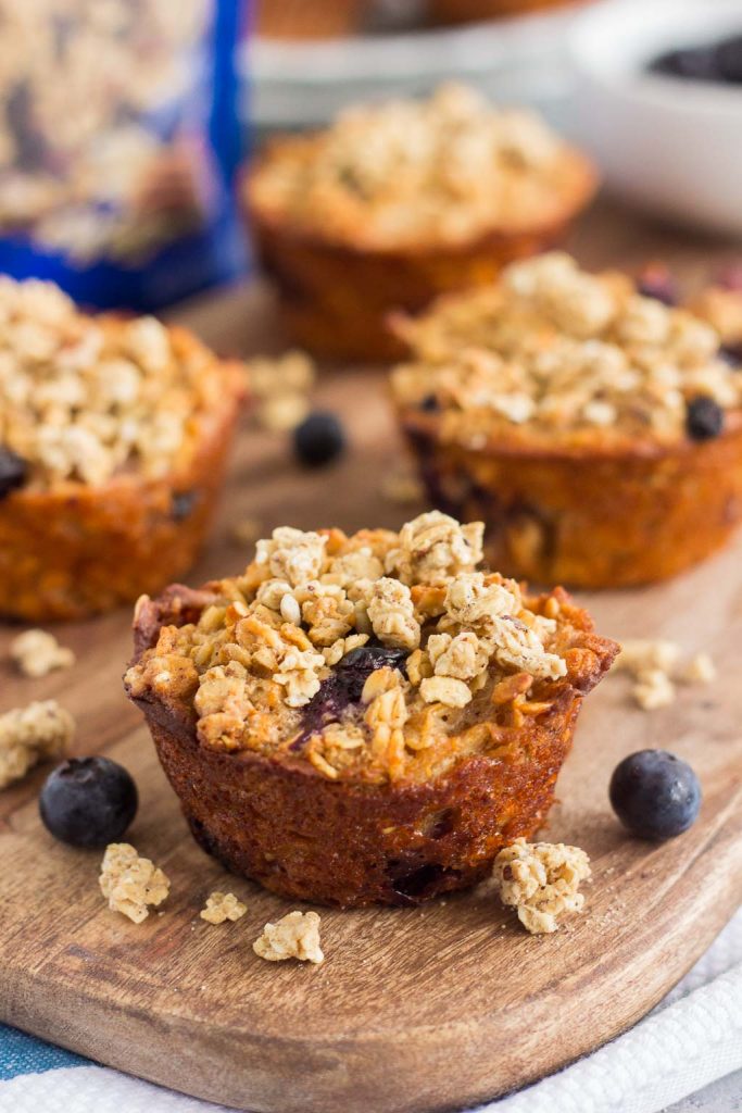 These Blueberry Granola Oatmeal Muffins are packed with hearty oats, fresh blueberries, and topped with sweet granola. Crunchy on the outside and soft on the inside, this simple breakfast can be prepped the night before and made in the morning. These muffins make the most deliciously easy on-the-go breakfast or snack!