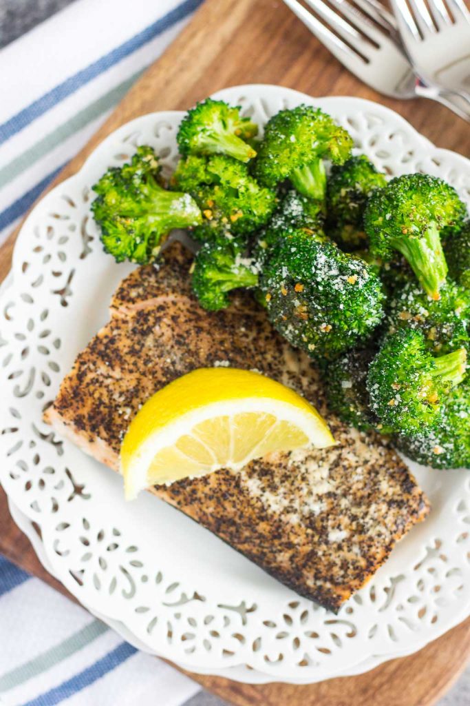 Roasted Garlic Parmesan Broccoli is an easy side dish that's bursting with flavor. Fresh broccoli is tossed with a mixture of garlic and Parmesan cheese, which results in a slightly crisp texture and seasoned to perfection. Prepped and cooked in one pan, you'll have this roasted vegetable ready in no time!