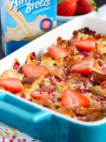 This Strawberries and Cream Croissant Bake is bursting with fresh strawberries, sweetened cream cheese and soft croissants. It's an easy, make-ahead dish that'll be the perfect addition to your breakfast or brunch table!