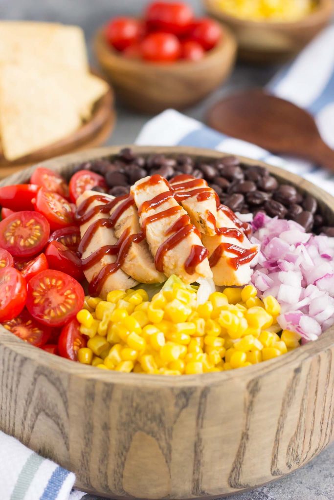 This Barbecue Ranch Chicken Salad is packed with fresh greens, tender chicken, black beans, corn, tomatoes, red onion, and avocado. It's tossed with a creamy barbecue 