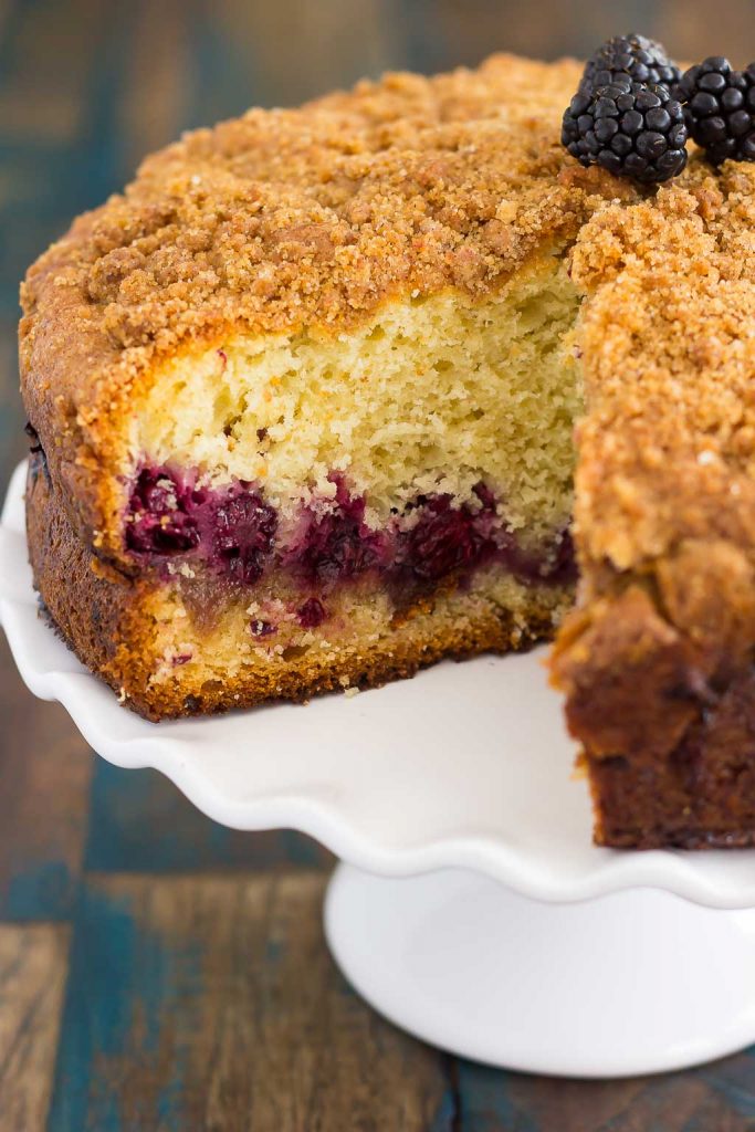 This Blackberry Crumb Coffee Cake features a soft and moist cake, filled with a layer of cinnamon streusel and juicy blackberries. Sprinkled with a crumb topping and baked until perfect, this coffee cake makes a delicious breakfast or light dessert!