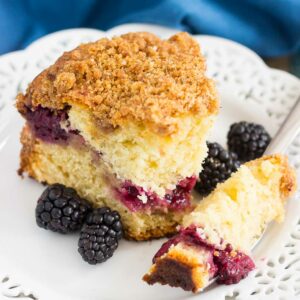 This Blackberry Crumb Coffee Cake features a soft and moist cake, filled with a layer of cinnamon streusel and juicy blackberries. Sprinkled with a crumb topping and baked until perfect, this coffee cake makes a delicious breakfast or light dessert!