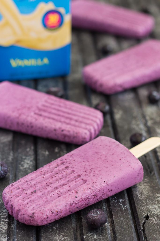 These Blueberry Cheesecake Pops taste like your favorite baked good, in frozen form. Filled with a cream cheese mixture that's studded with blueberries, these pops take just minutes to make and are perfect for cooling off with on a hot, summer day!