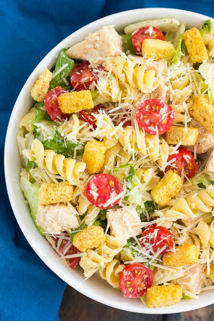 overhead view of a large bowl of chicken caesar pasta salad