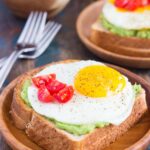 This Fried Egg and Avocado Toast is a deliciously simple way to jazz up your breakfast or snack. Hearty bread is toasted and then topped with mashed avocado, a fried egg, and cherry tomatoes. It’s ready in just minutes and is full of healthy ingredients!