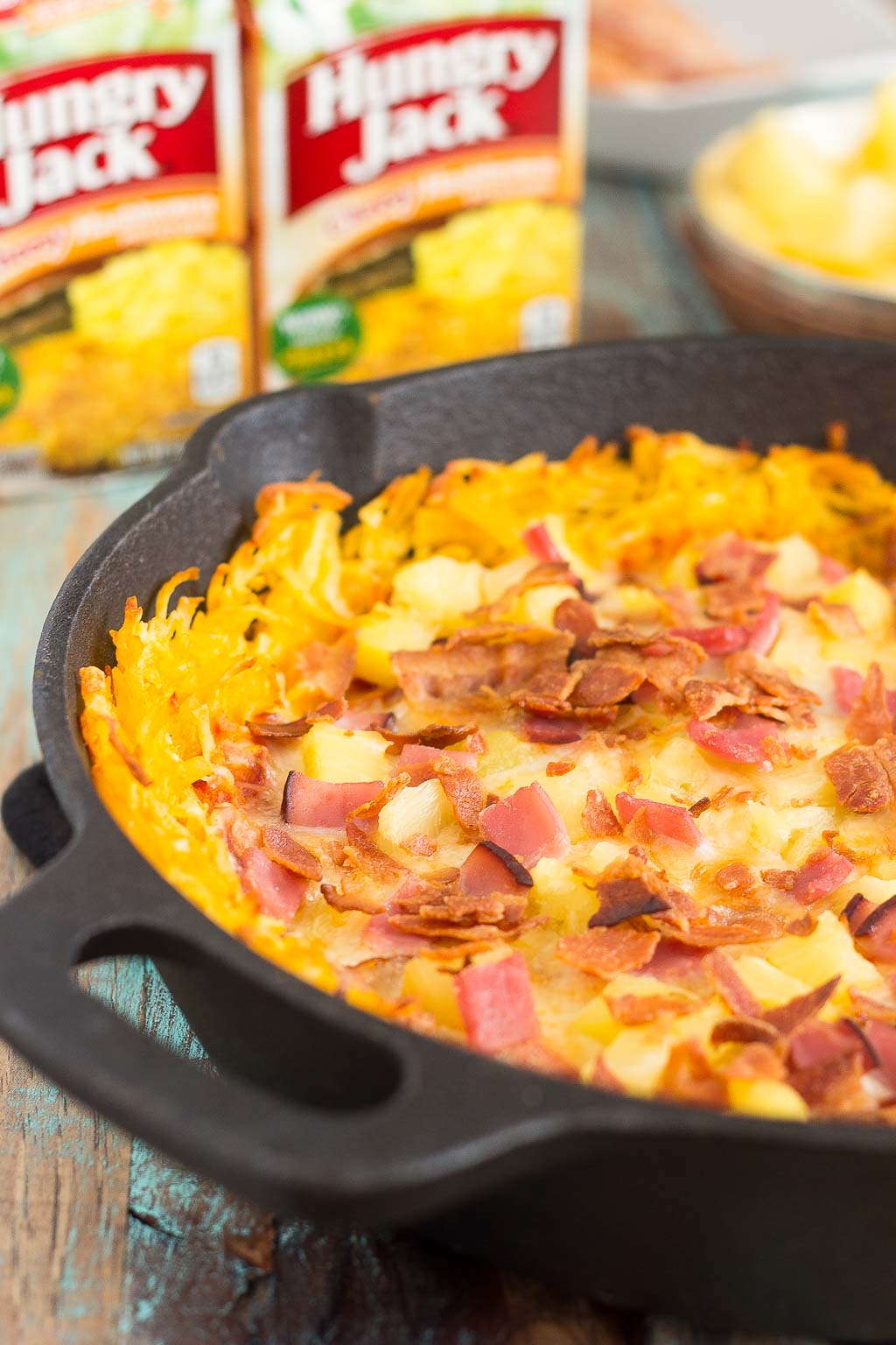 Put a spin on pizza night with hashbrowns for dinner! This Hawaiian Pizza with Hashbrown Crust features a cheesy, crispy hashbrown crust that's loaded with two types of meat, pineapple chunks, and melted, mozzarella cheese. Easy to make and full of flavor, this pizza will be your new favorite dish!