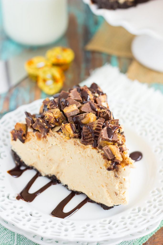 This No-Bake Peanut Butter Cheesecake has an Oreo peanut butter cookie crust, a creamy peanut butter filling, and chopped peanut butter cups on top!