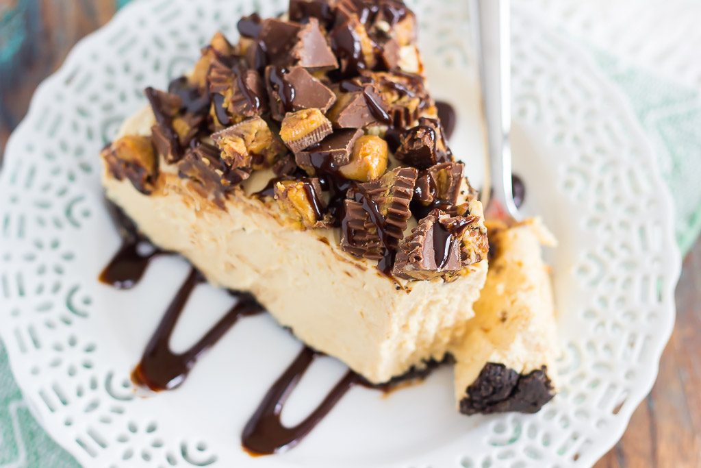 This No-Bake Peanut Butter Cheesecake has an Oreo peanut butter cookie crust, a creamy peanut butter filling, and chopped peanut butter cups on top!