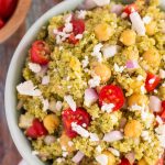 This Quinoa and Chickpea Pesto Salad is filled with chickpeas, hearty quinoa, cherry tomatoes, red onions, and crumbled feta cheese. It's tossed with a zesty pesto sauce that packs a punch of flavor in every bite. It's easy to prepare and makes simple dish that's perfect for lunch or dinner!