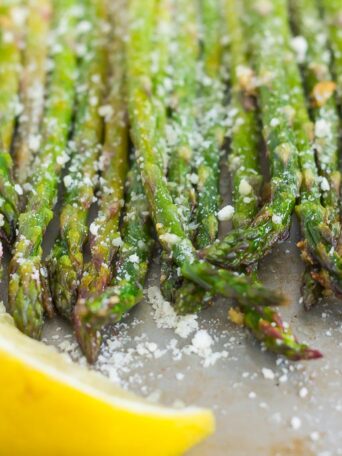 asparagus in a pan with lemon