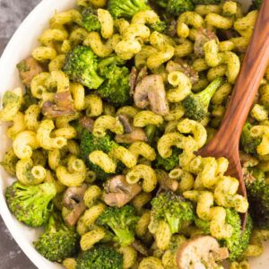 This Basil Pesto Pasta with Broccoli and Mushrooms is an easy dish that's full of flavor. Tender pasta is tossed with basil pesto, sautéed mushroom, and fresh broccoli. It's simple to make and is perfect for busy weeknights!