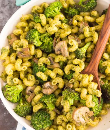 This Basil Pesto Pasta with Broccoli and Mushrooms is an easy dish that's full of flavor. Tender pasta is tossed with basil pesto, sautéed mushroom, and fresh broccoli. It's simple to make and is perfect for busy weeknights!
