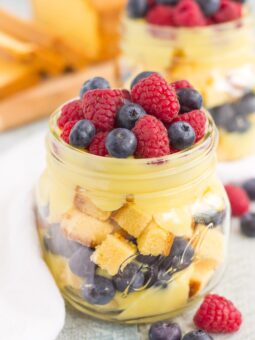 This Berry Vanilla Pudding Pound Cake Trifle is filled with creamy, whipped vanilla pudding, buttery pound cake chunks, and fresh blueberries and raspberries. It's layered together to create an easy summer treat that's ready in no time!