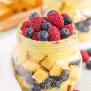 This Berry Vanilla Pudding Pound Cake Trifle is filled with creamy, whipped vanilla pudding, buttery pound cake chunks, and fresh blueberries and raspberries. It's layered together to create an easy summer treat that's ready in no time!