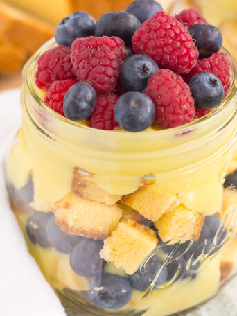 This Berry Vanilla Pudding Pound Cake Trifle is filled with creamy, whipped vanilla pudding, buttery pound cake chunks, and fresh blueberries and raspberries. It's layered together to create an easy summer treat that's ready in no time!