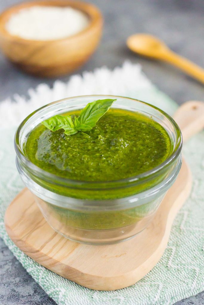 This Easy Basil Pesto combines fresh basil leaves, Parmesan cheese, garlic cloves, pine nuts, and olive oil. It's a simple sauce that comes together in minutes and is perfect for serving with pasta, bread, chicken, and a variety of other dishes!