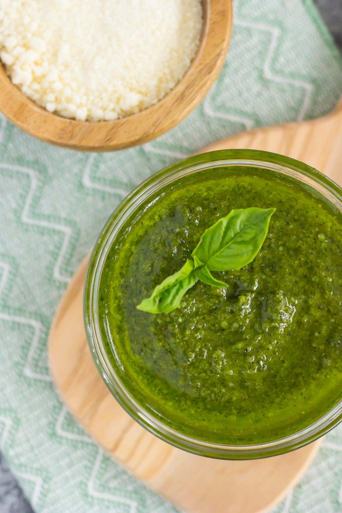 This Easy Basil Pesto combines fresh basil leaves, Parmesan cheese, garlic cloves, pine nuts, and olive oil. It's a simple sauce that comes together in minutes and is perfect for serving with pasta, bread, chicken, and a variety of other dishes!