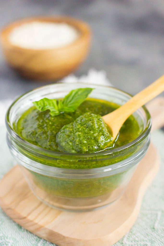 This Easy Basil Pesto combines fresh basil leaves, Parmesan cheese, garlic cloves, pine nuts, and olive oil. It's a simple sauce that comes together in minutes and is perfect for serving with pasta, bread, chicken, and a variety of other dishes!