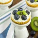 These Mini Blueberry Kiwi Tarts start with a simple, vanilla crust that's packed with a creamy mascarpone filling and topping with fresh blueberries and kiwi. This easy, make-ahead dessert is perfect to serve for your next party or get-together!