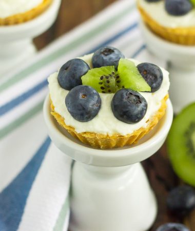 These Mini Blueberry Kiwi Tarts start with a simple, vanilla crust that's packed with a creamy mascarpone filling and topping with fresh blueberries and kiwi. This easy, make-ahead dessert is perfect to serve for your next party or get-together!