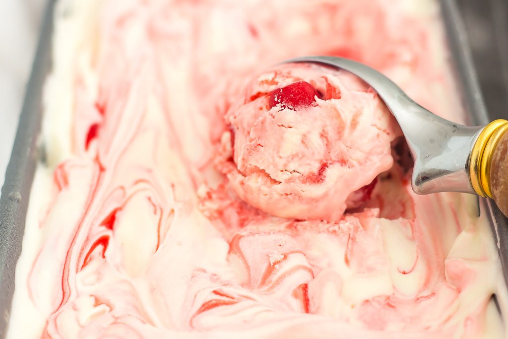 This easy, five ingredient Cherry Cheesecake Ice Cream is cool, creamy and packed with flavor. This no-churn treat features a vanilla cheesecake base that's loaded with juicy cherries. And best of all, it's made without an ice cream maker!