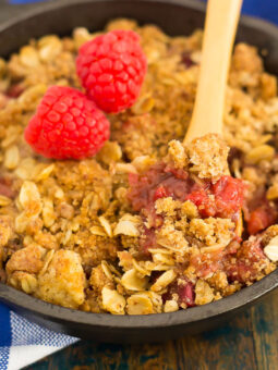 This Raspberry Rhubarb Crisp is filled with sweet raspberries, fresh rhubarb, and sprinkled with a brown sugar oat crumble. It's prepared in just minutes and makes an easy dessert that's perfect to enjoy all year long!