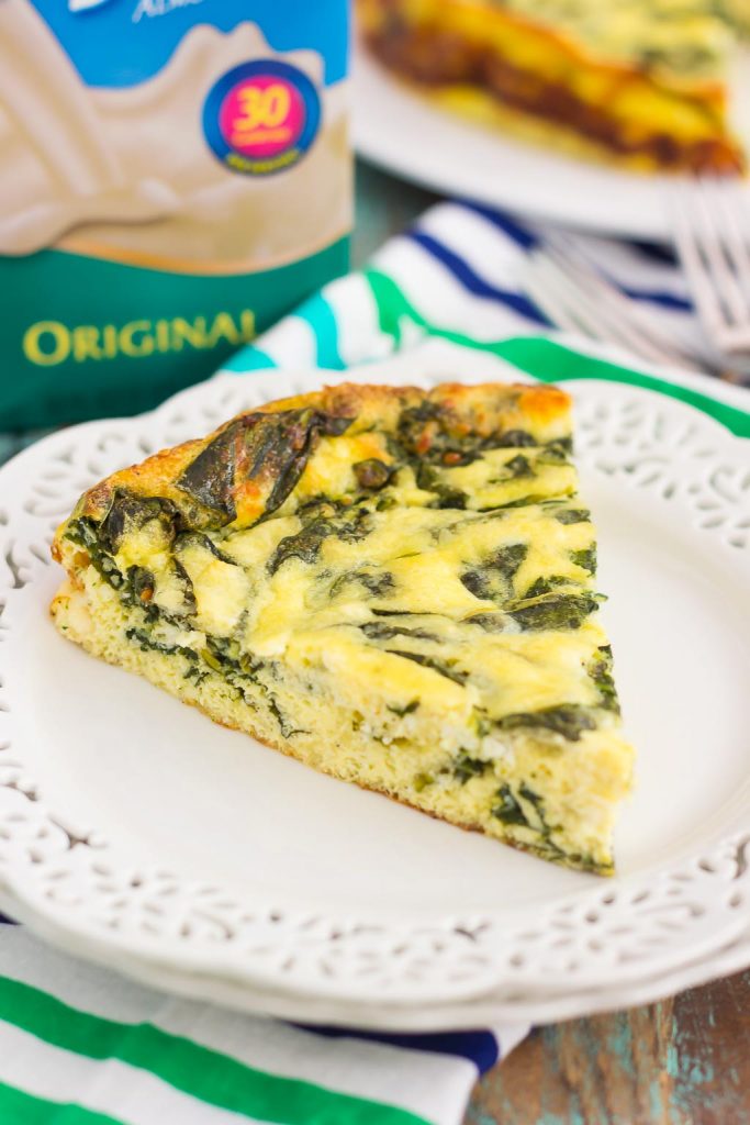 This Spinach and Feta Frittata is full of fresh spinach and creamy feta cheese. It's healthy, gluten free, and perfect for just about any meal. If you're looking for that delicious meatless dish for breakfast, brunch, or dinner, then this is it!