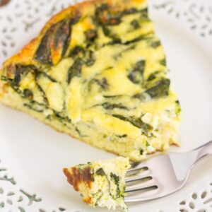 This Spinach and Feta Frittata is full of fresh spinach and creamy feta cheese. It's healthy, gluten free, and perfect for just about any meal. If you're looking for that delicious meatless dish for breakfast, brunch, or dinner, then this is it!