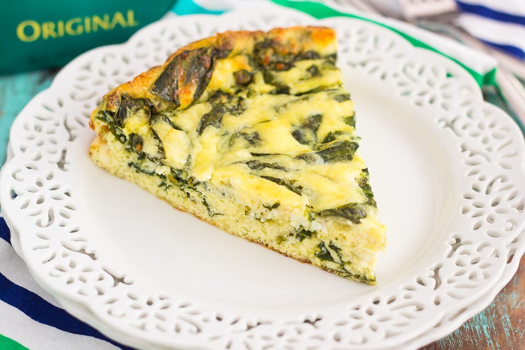 This Spinach and Feta Frittata is full of fresh spinach and creamy feta cheese. It's healthy, gluten free, and perfect for just about any meal. If you're looking for that delicious meatless dish for breakfast, brunch, or dinner, then this is it!